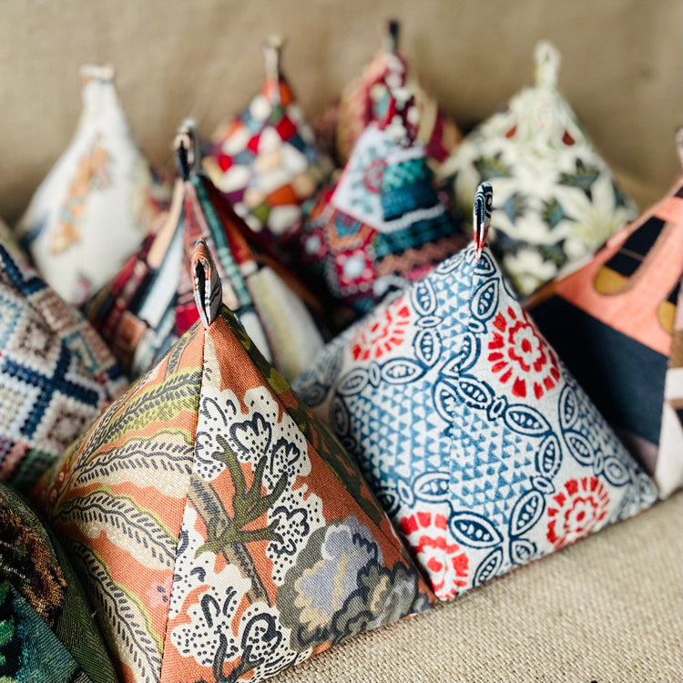 Handcrafted boho and mid-century modern fabric doorstops by Green Bee Interiors