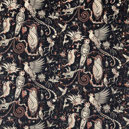 Patterned fabric with birds and floral designs on a dark background