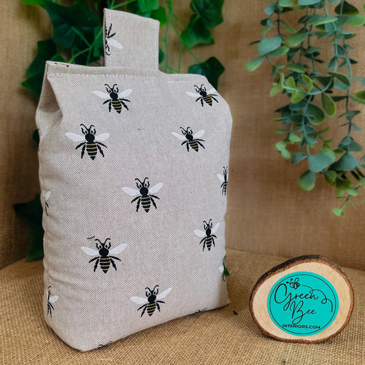 Handcrafted large Farm House Style Bumble Bee wheat-filled door stop. Crafted from neutral beige printed linen blend fabric. Measures 22cm tall x 15cm x 7cm at the base. Perfect gift available filled or with Velcro closing to fill at home.