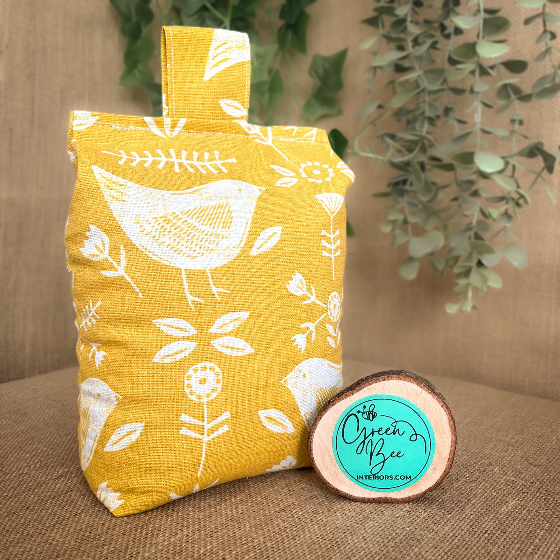 Handcrafted large yellow bird Scandinavian inspired wheat-filled door stop, crafted from high quality printed cotton. Measures 22cm tall x 15cm x 7cm at the base.